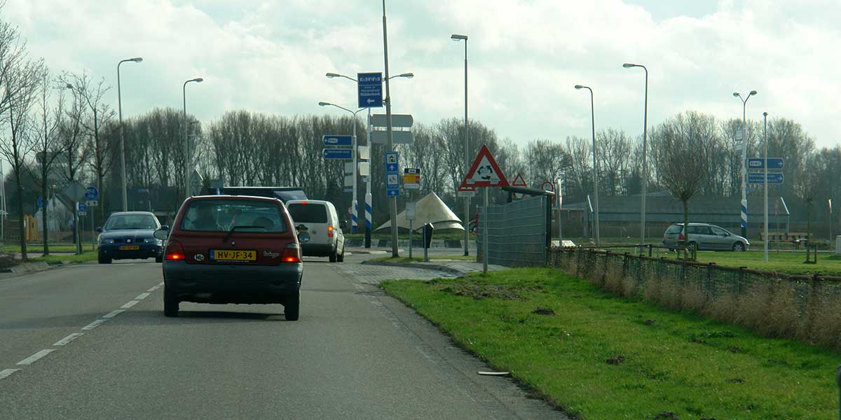 Vortical, emerging between the traffic - ferrocement sculpture on roundabout in Barendrecht