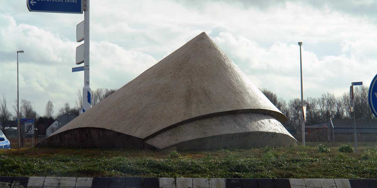 Vortical, ferrocement sculpture on roundabout in Barendrecht