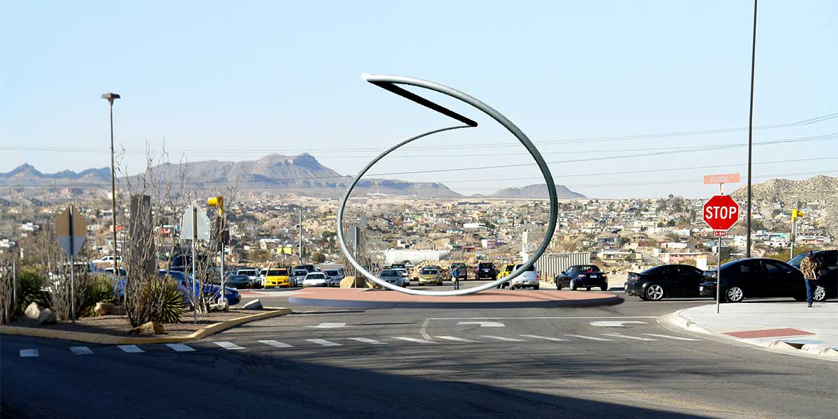Photomontage showing sculpture with Ciudad Juárez visible in the background
